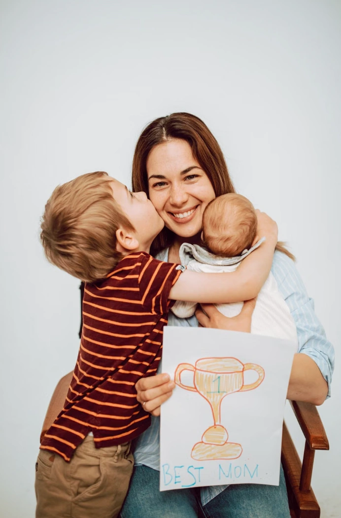 Family enjoying everyday moments together, featured on the Miss Av blog